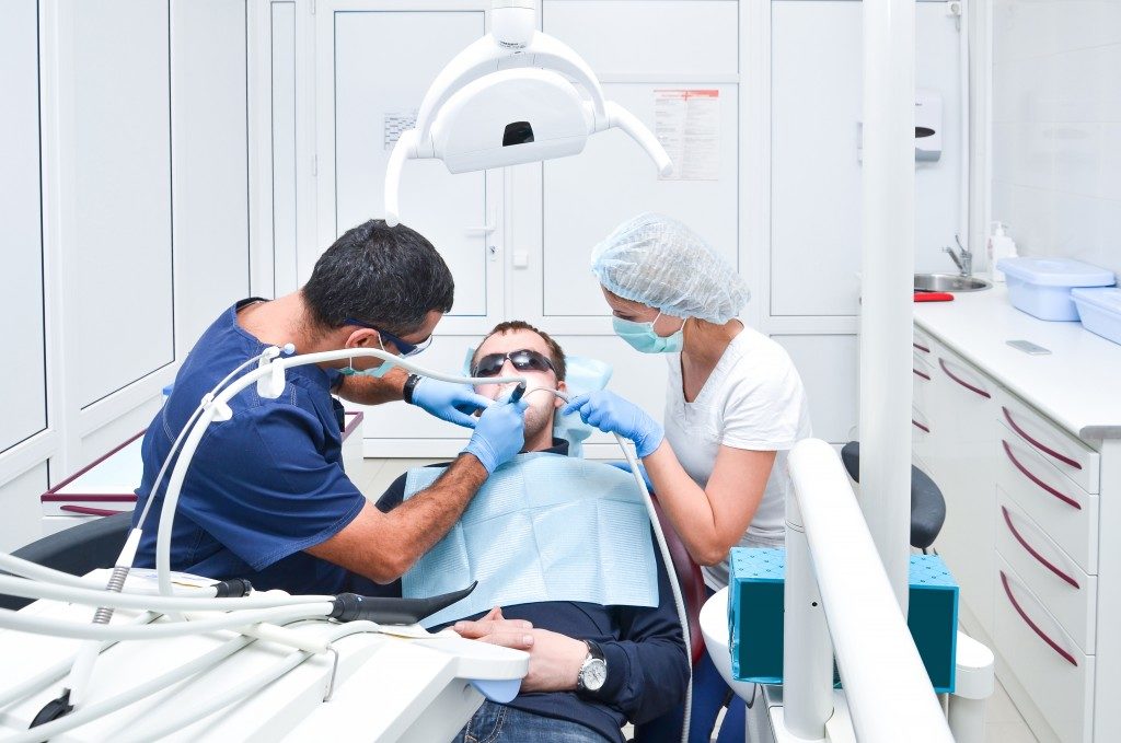 Patient undergoing a dental operation