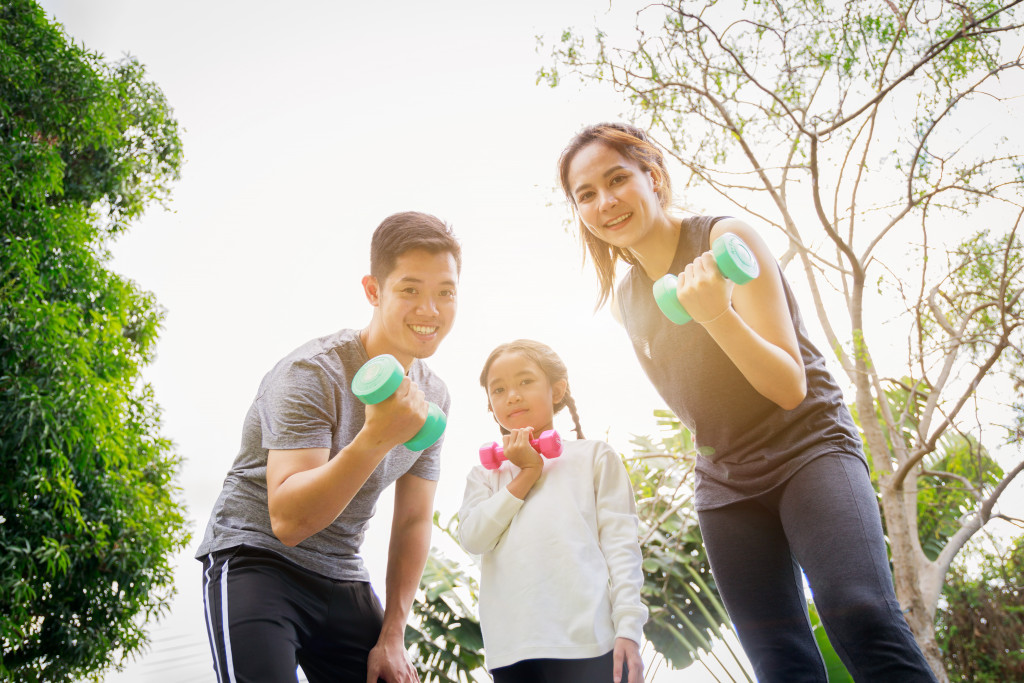 A family doing outdoor exercise