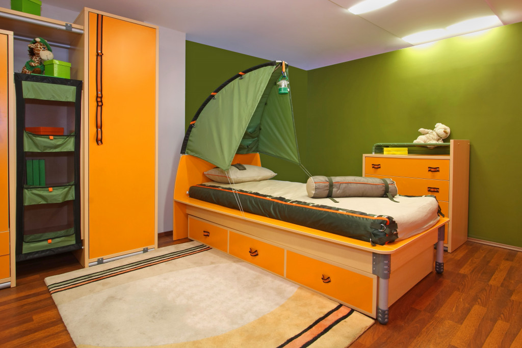 A camping-themed child's bedroom