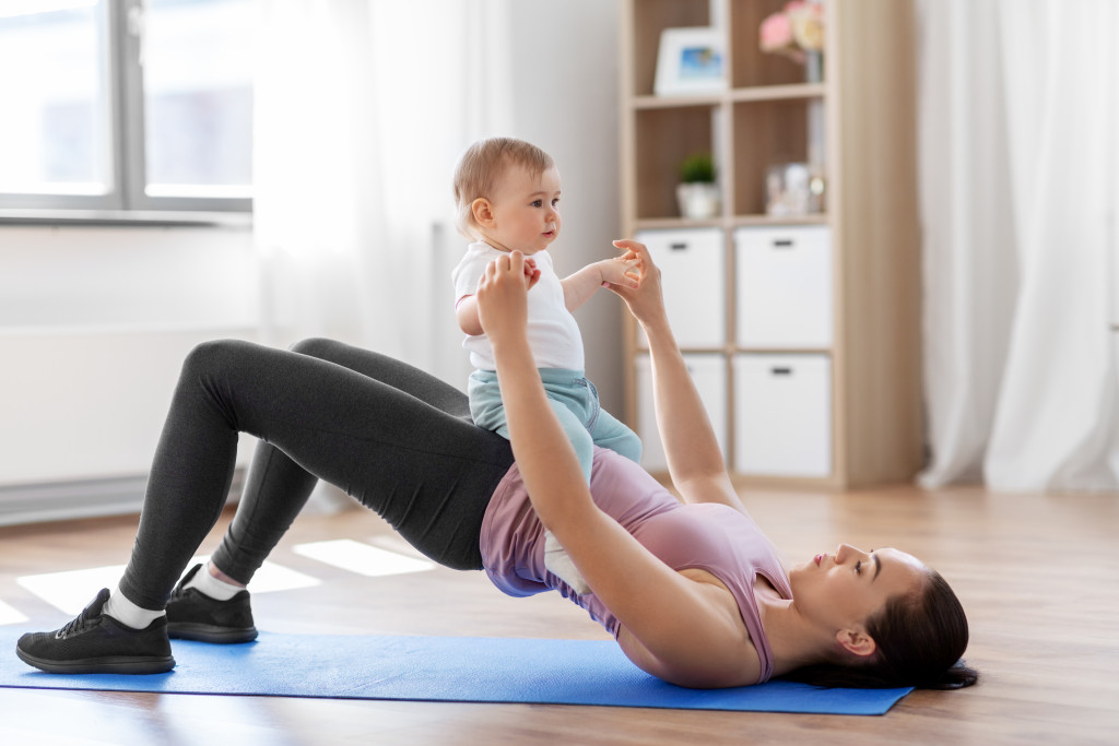 mother and baby exercising together