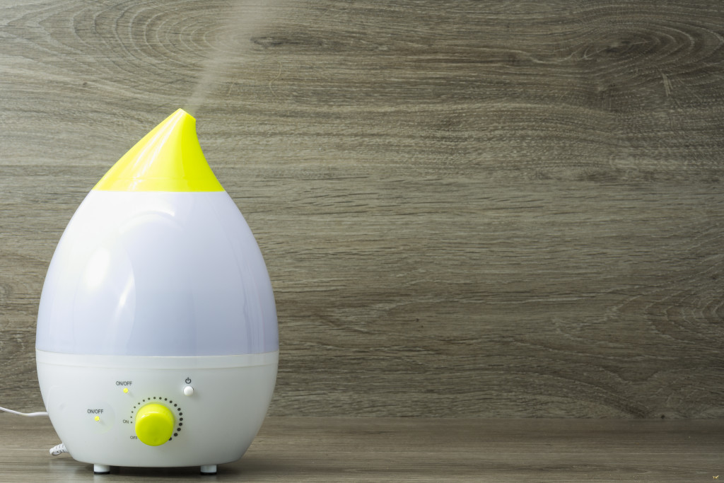 An air humidifier on wooden background